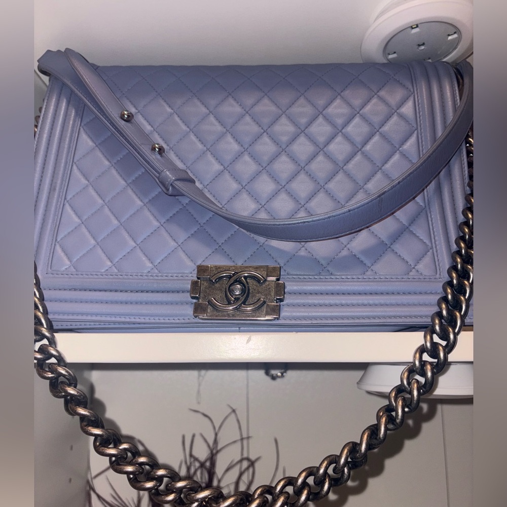 CHANEL Elegant Gray Fabric with Iconic Emblem